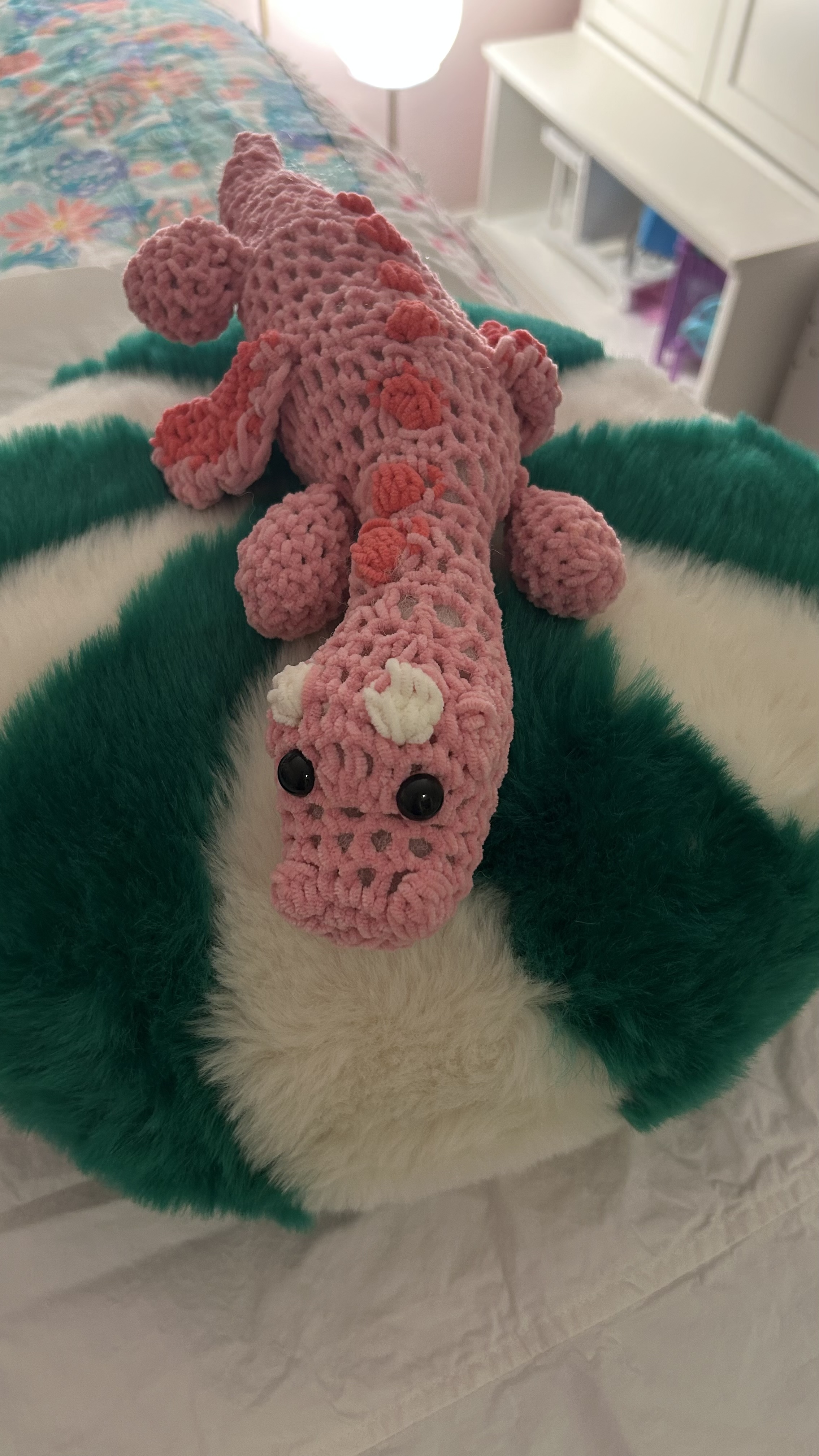 Crocheted pink dragon